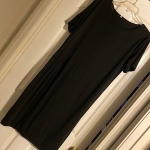 Long, high slit, black tee. Size large.
